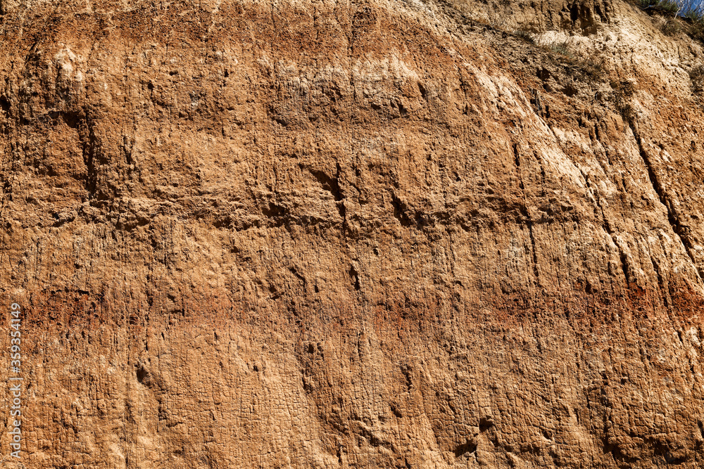 Texture of clay mountain as background