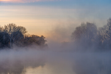 Wall Mural - fall landscape with river on sunrise and over water