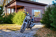 Motorcycle On The Background Of A Country House
