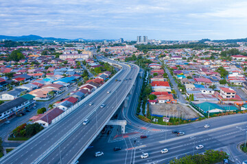 Wall Mural - Aerial image of car moving on Kota Kinabalu City, Sabah, Malaysia