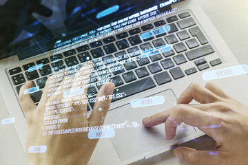 Poster - Double exposure of abstract programming language hologram with hands typing on laptop on background, research and development concept