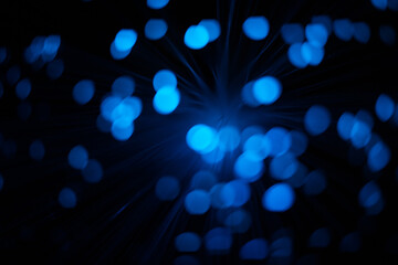 Wall Mural - blue abstract round particles and lines with bokeh and blur.