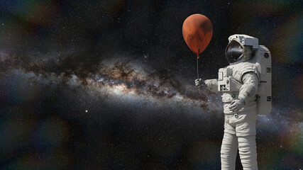 Wall Mural - astronaut with mars balloon in front of the galaxy in empty space