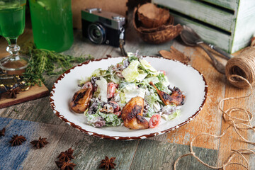 Wall Mural - Salad with fried quail mushrooms and greens