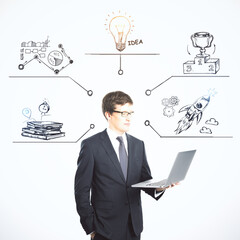 Aufkleber - Businessman with laptop and drawing business idea sketch