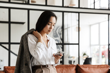 Poster - Beautiful young asian woman wearing white shirt