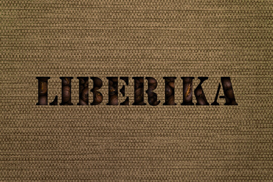 Liberica text made up of coffee beans on a background of canvas fabric