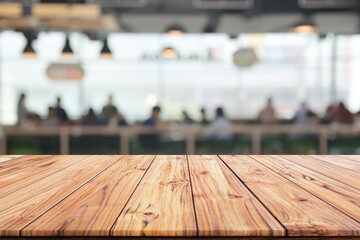 Wall Mural - Wooden table top on blurred background of interior coffee shop or restaurant blur cafe coffee shop background