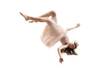 Mid-air Beauty Cought In Moment. Full Length Shot Of Attractive Young Woman Hovering In Air And Keeping Eyes Closed. Levitating In Free Falling, Lack Of Gravity. Freedom, Emotions, Artwork Concept.