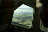 Fototapeta  - Aerial view on plane window at green fields from Addis Ababa, aircraft aviation business in Africa