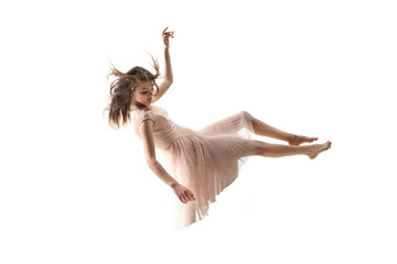 mid-air beauty cought in moment. full length shot of attractive young woman hovering in air and keep