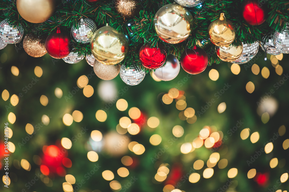 Closeup of decorate ornament on Christmas tree with bokeh light ...