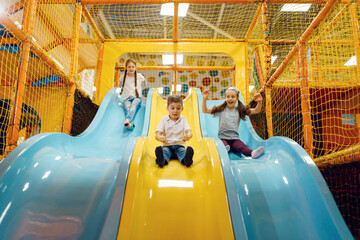 Wall Mural - Children ride down the hill, entertainment center