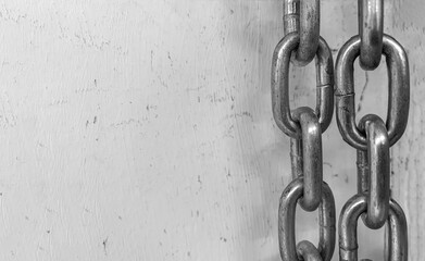 large chain links on a gray background. the concept of bondage and restriction of freedom. slavery. 