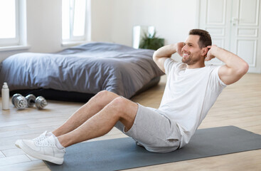 Aufkleber - Man Exercising Doing Abs Sitting On Mat Training At Home