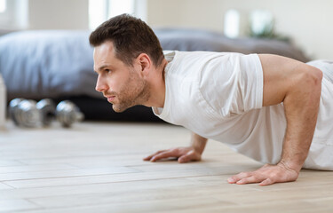 Aufkleber - Sporty Man Doing Push-Ups Exercise Training Indoor On Weekend