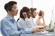 © Prostock-studio - Telemarketing or customer service team providing assistance to clients at call centre office