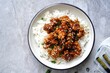 © vm2002 - Homemade sesame Chicken served with Jasmine white rice, selective focus