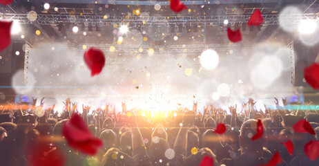 Wall Mural - Concert crowd in front of a brightly lit stage; in the background clapping hands and lights are visible