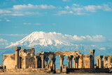 Fototapeta Las - View of Zvartnots Temple on the background of Mount Ararat - a tourist attraction of Armenia