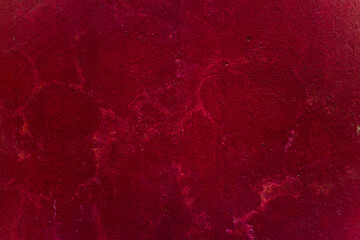 Old burgundy red textured wall, with cracks and stripes. Beautiful abstract background. High quality photo