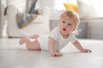 Sticker - Cute little baby on floor at home