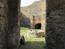 View Of An Old Kitchen And Oven In The Ruins Of Pompeii In Italy On A Sunny Day