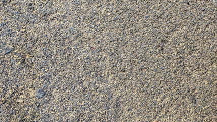 background view of a road having rough surface