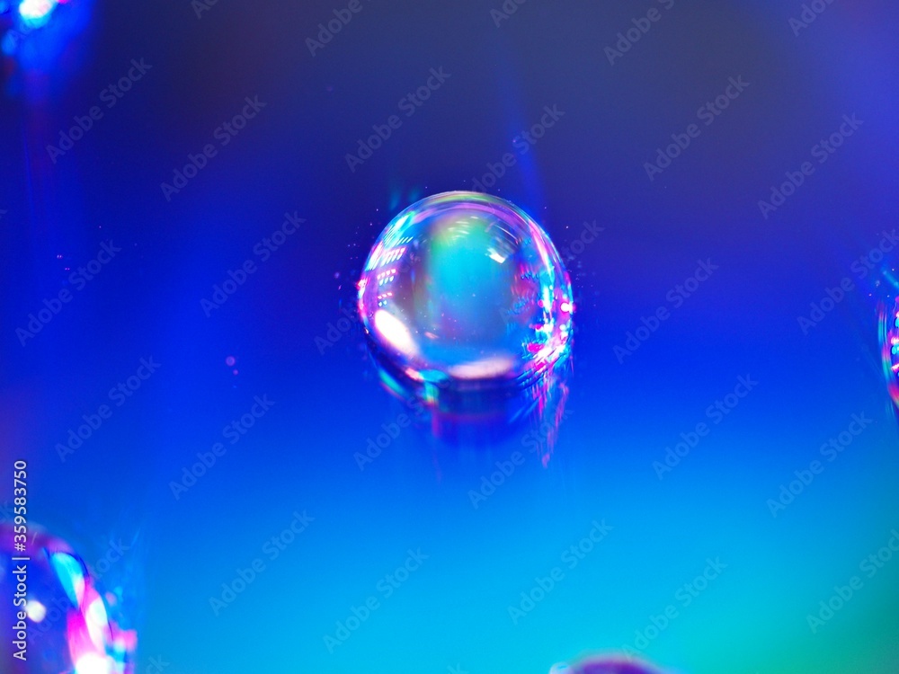 blurred water droplets with blue light on bright backgronud, dark and shiny , abstract background, macro image for card design - obrazy, fototapety, plakaty 