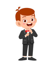 happy cute kid boy wear suit blazer tuxedo