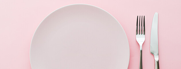 Wall Mural - Empty plate and cutlery as mockup set on pink background, top tableware for chef table decor and menu branding design