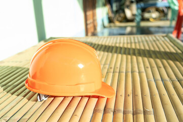 Orange safety helmet hat for safety workman as engineer or worker.