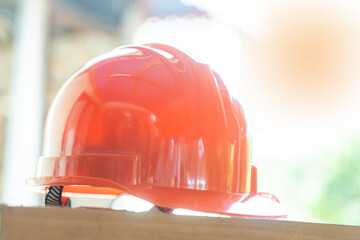 Orange safety helmet hat for safety workman as engineer or worker.