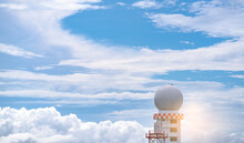 Weather Observations Radar Dome Station Against Blue Sky And White Fluffy Clouds. Aeronautical Meteorological Observations Station Tower Use For Safety Aircraft In Aviation Business. Spherical Tower.