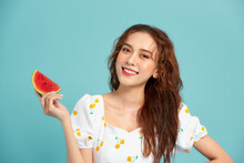 Happy Young Woman Holding Watermelon