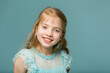 © lotosfoto - Portrait of a little girl close-up.Isolated on white background.