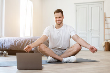 Aufkleber - Man Doing Yoga At Home Sitting In Lotus Position Indoors