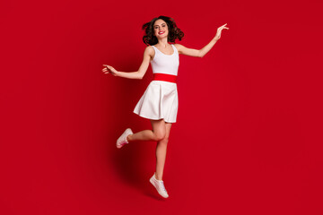 Canvas Print - Full length photo of funny crazy lady jump high up good mood rejoicing active lifestyle lovely graceful girl wear white short dress footwear isolated red bright color background