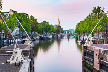 Wall Mural - Amsterdam streets, canals during dusk on the Sint Antoniesluis