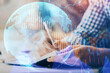 © peshkova - Multi exposure of two men planing investment with stock market forex chart.