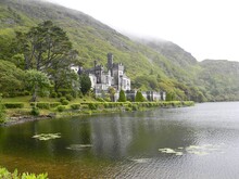 The Misty Connemara Mountains And Kylemore Abbey Near Galway Ireland