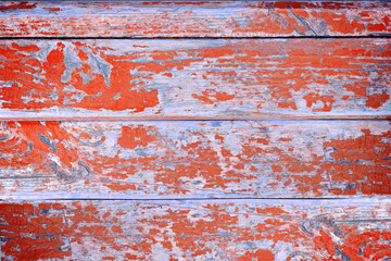 Wooden texture with scratches and cracks. Red background