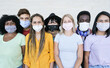 © Sabrina - Happy multiracial friends laughing and wearing protective face mask - Group of young peoples having fun together - Concept of lifestyle, health care and the new normality