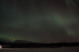 Fototapeta Tęcza - majestic aurora borealis over night sky