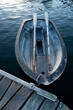 Peaceful scene of a wooden row boat and oars on a dock in a harbor at Bainbridge Island Seattle Washington 
