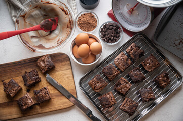 Canvas Print - chocolate brownies with ingredients and baking tools