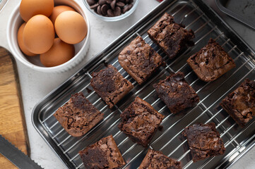 Wall Mural - chocolate brownies with ingredients and baking tools