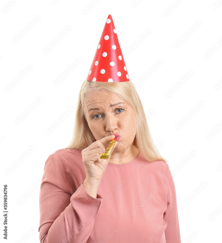 Sad mature woman celebrating Birthday on white background
