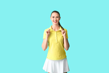 Poster - Beautiful young woman in stylish polo shirt on color background