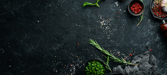 Wall Mural - Black stone culinary banner. Top view. Rustic style.